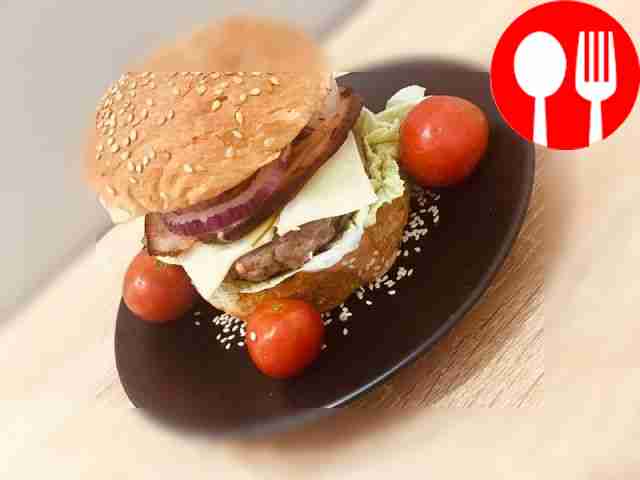 Tall hamburger with bacon