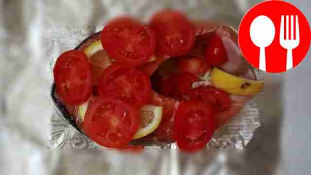 Place lemons and tomatoes on foil. Place the...