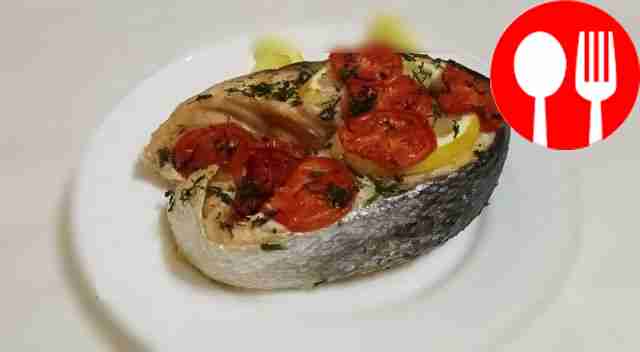 Juicy chum salmon steak cooked in foil