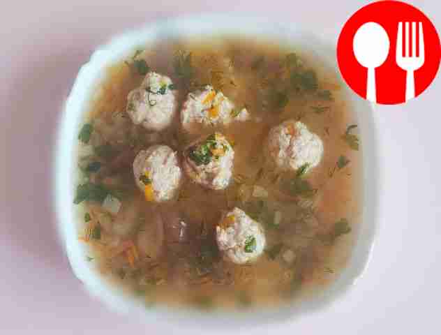 Rich soup with boletus, chicken meatballs and millet