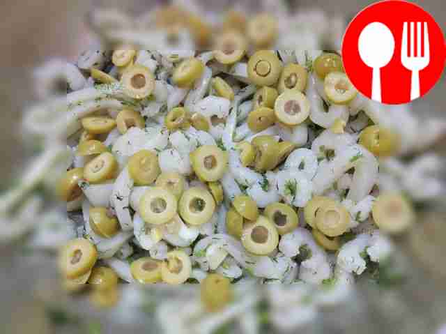 Cut the squid meat into rings and combine with...