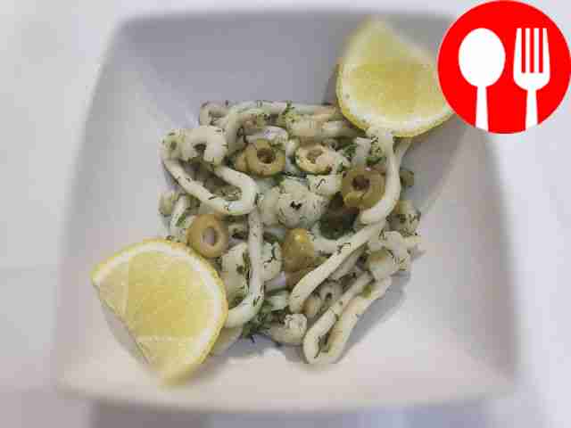 Place seafood cooked in foil on a serving...