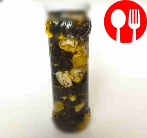 Place the olives and cheese in a jar, fill...