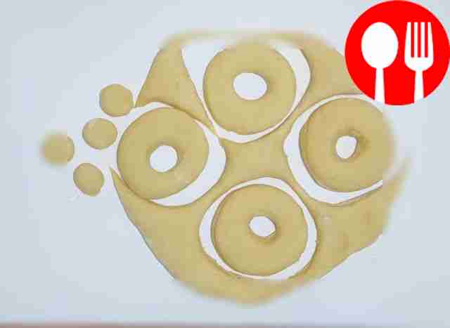 Roll out the risen dough into a layer. Using a...