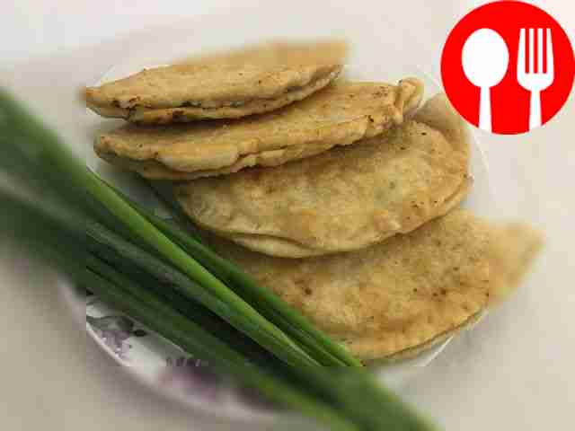 Serve the finished flatbreads hot. Sprinkle...