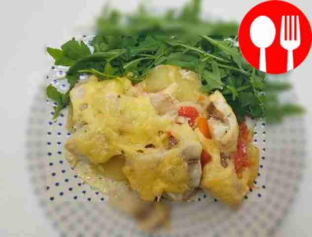 Spicy tilapia with potatoes and spices in the oven