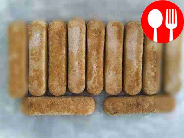 Dip the cookies, one at a time, into brewed...