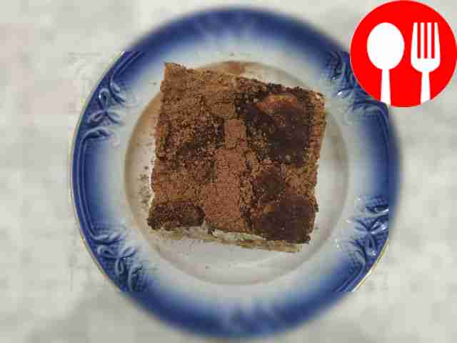 Serve tiramisu with cocoa powder sprinkled on...