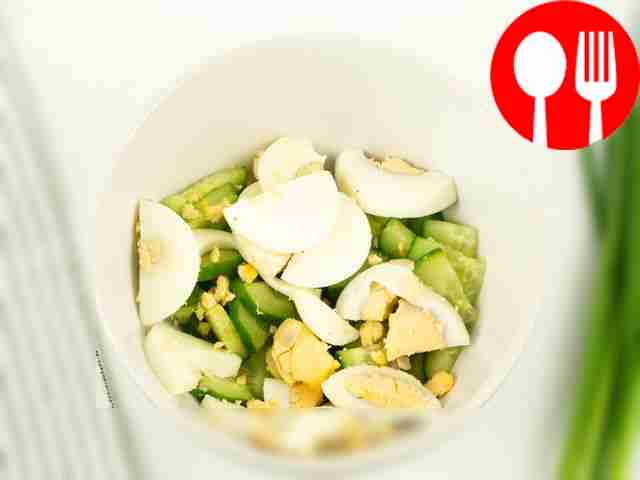 Place chopped cucumber and egg on a serving plate.