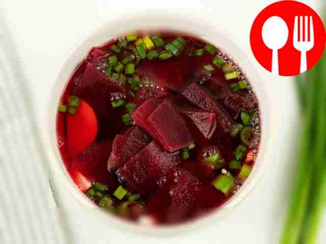Pour beet broth over the soup.
