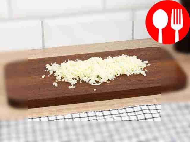 Grate the cheese on a fine grater.