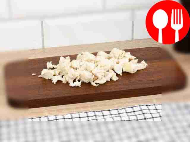 Cut the boiled chicken breast into cubes.