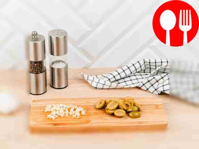Peel and chop two cloves of garlic. Cut the...
