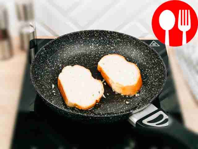 Place pieces of bread into the resulting garlic butter.