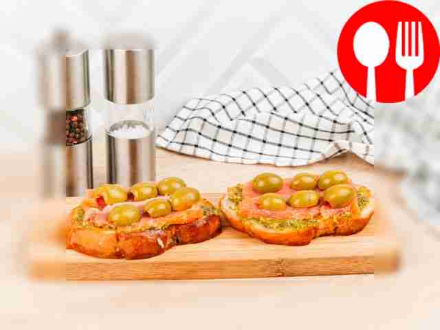Place olive halves on top.