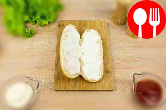 Cut the hot dog buns horizontally, without...