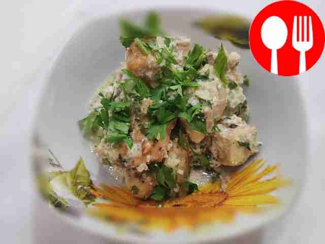 Chicken chkmeruli in creamy garlic sauce