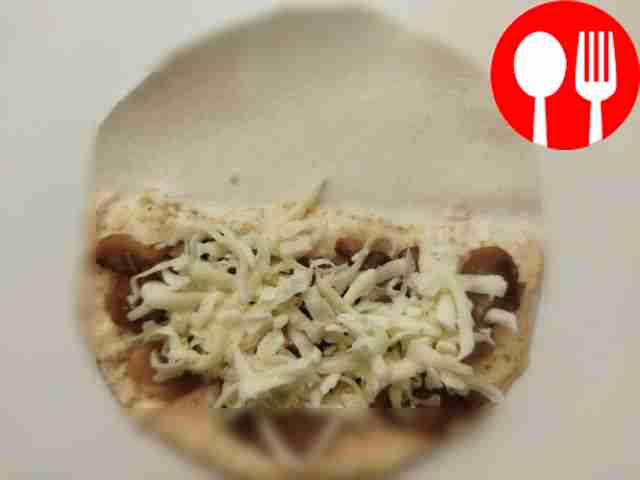 Fold the tortilla in half. In this way, put...