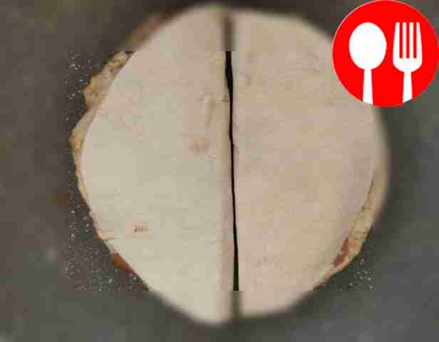 Serve the quesadilla on a plate with chopped...