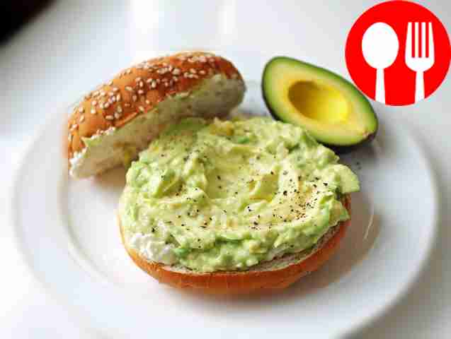 Hearty bun with cottage cheese and avocado