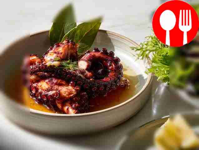 Baked octopus in wine-garlic sauce